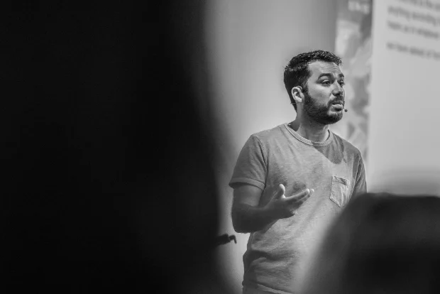 A teacher speaking to a group